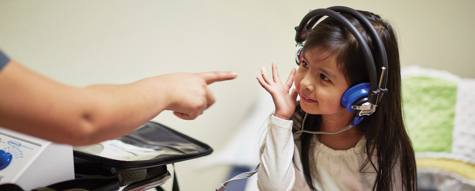Small child receives a hearing test