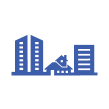 Icon showing three buildings of various sizes and types making up a community