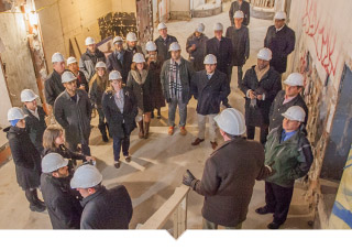 Capital Impact Staff give tour of construction site to group of individuals