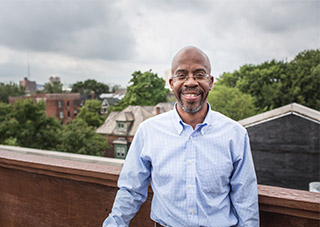 Detroit developer Richard Hosey poses on rooftop