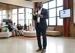 Capital Impact's president and CEO addresses staff.