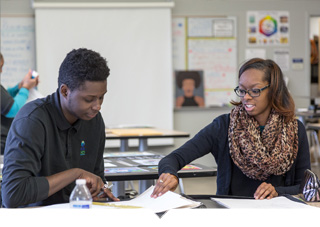 Three charter high school students study together