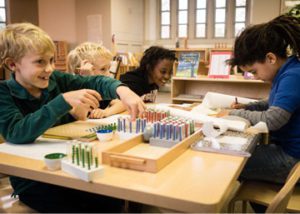 Students work on a common project.