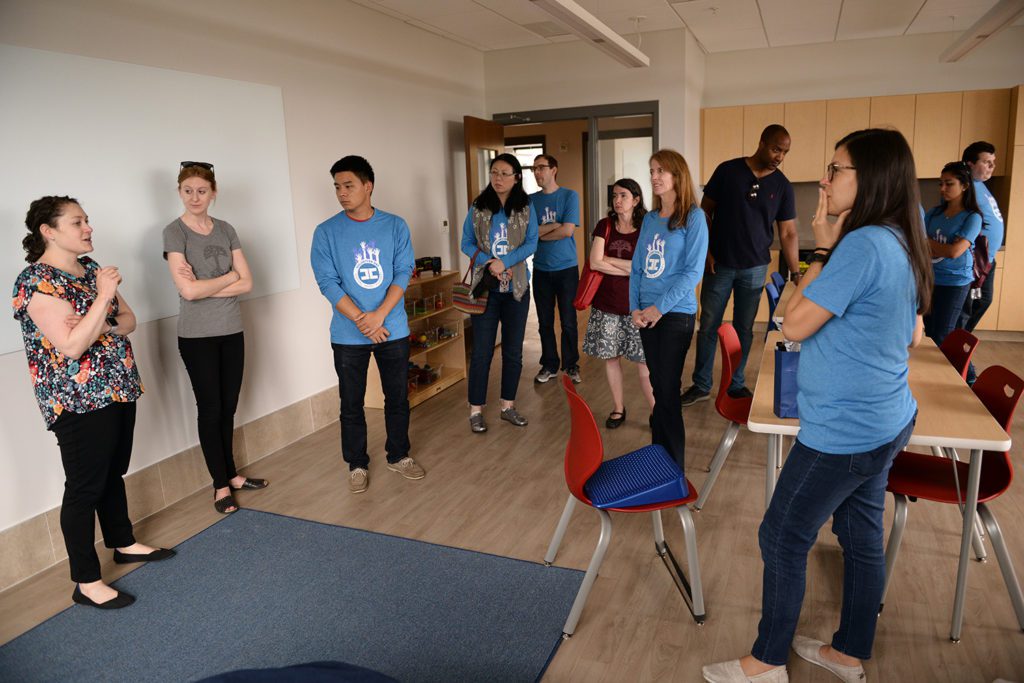 Martha's Table staff show a class room in the new headquarters