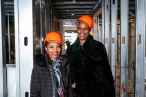 Two real estate developers in hard hats