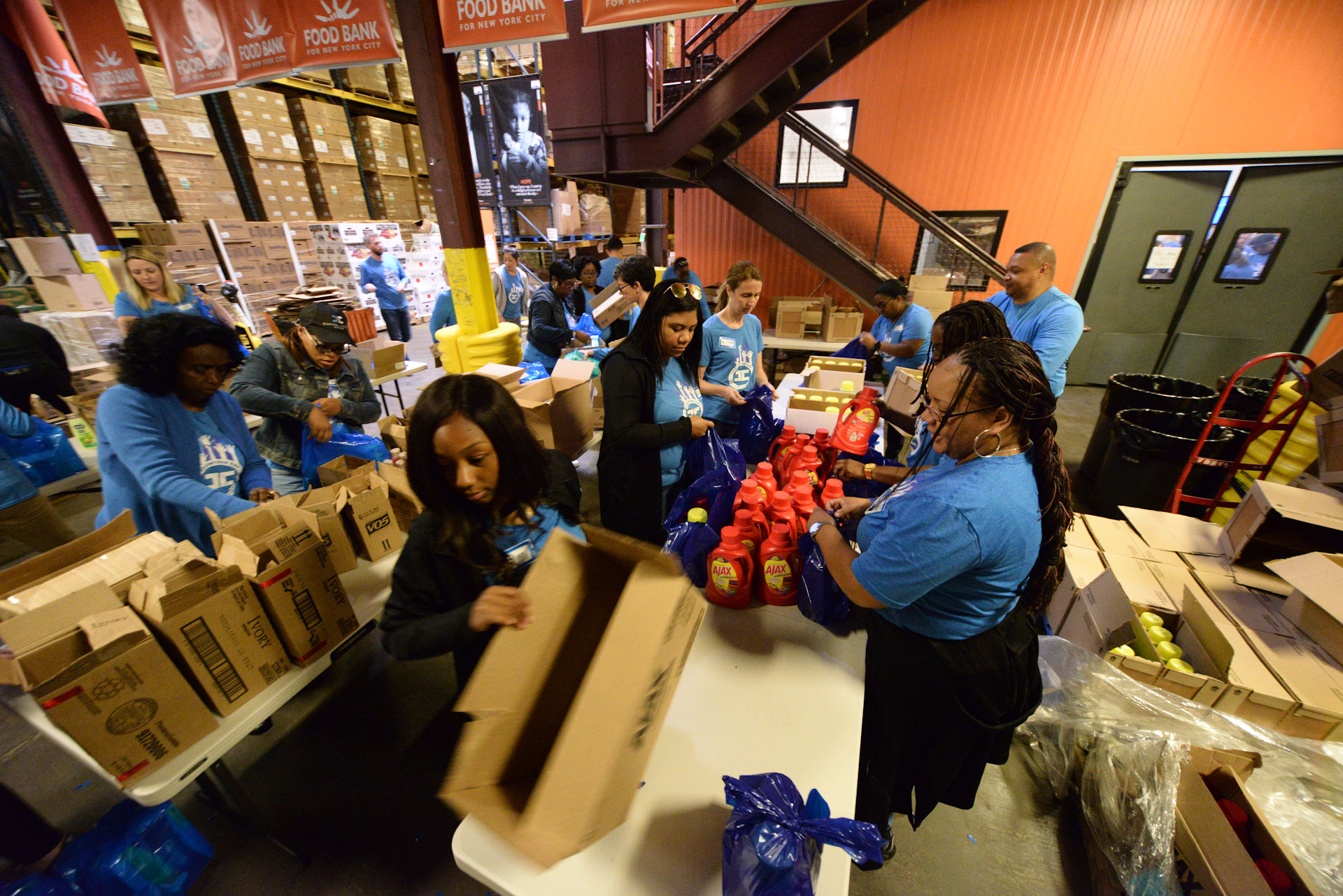 Capital Impact Staff packing items on volunteer day