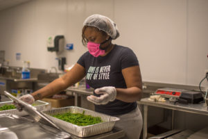 ChiFresh worker-owner preparing meals
