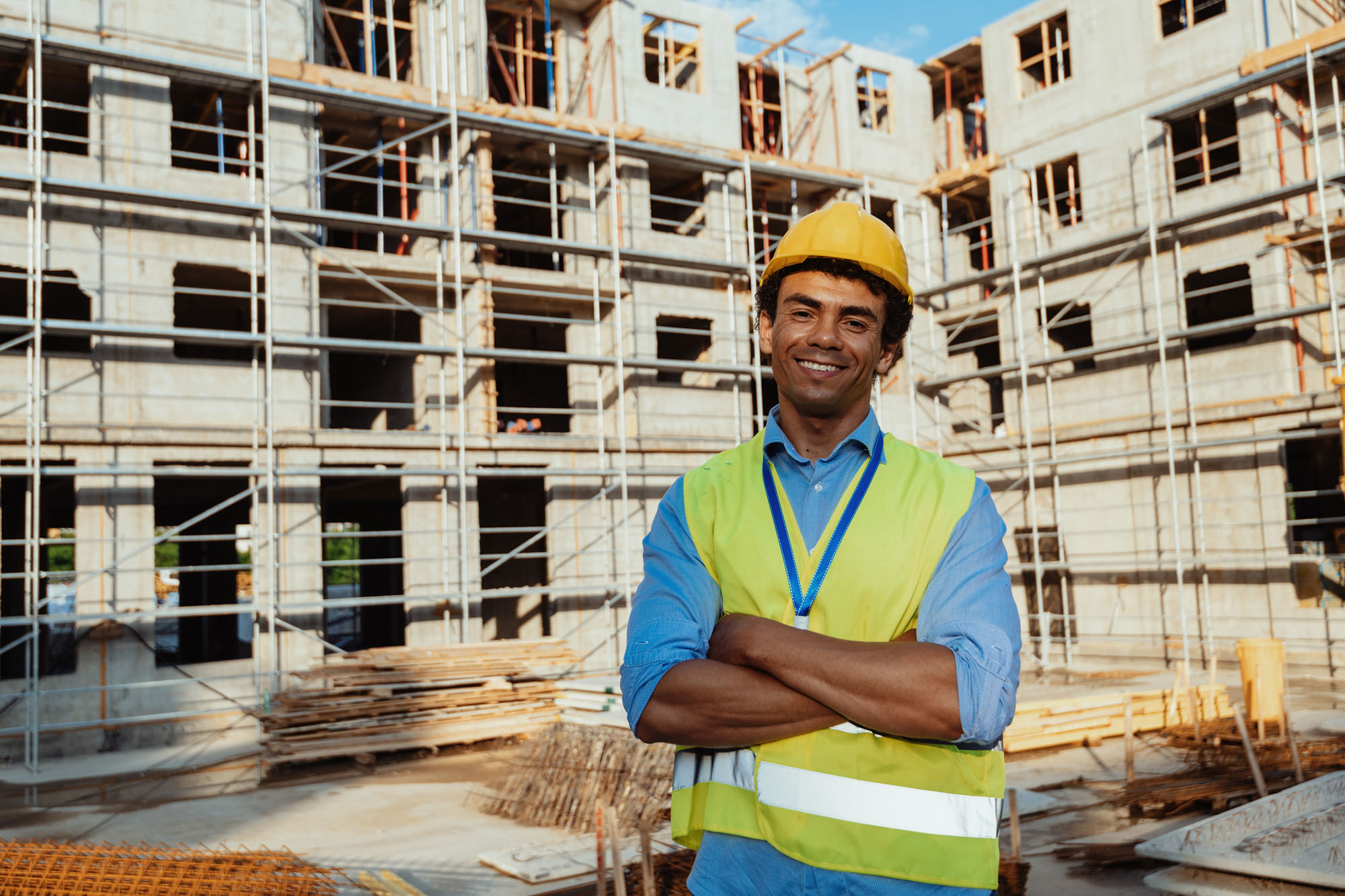 Latino real estate developer on construction site