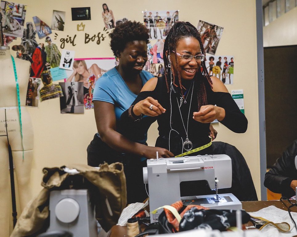 Women of Custom Collaborative work at sewing machines