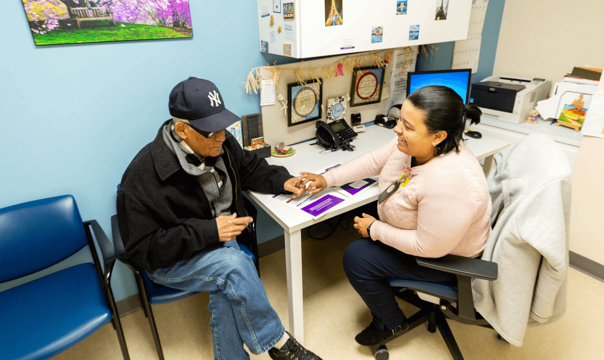 Nurse practitioner meets with a patient in the office