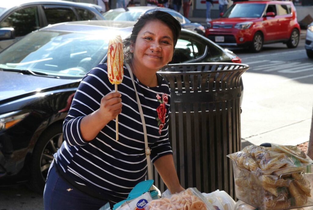 A street vendor sells food