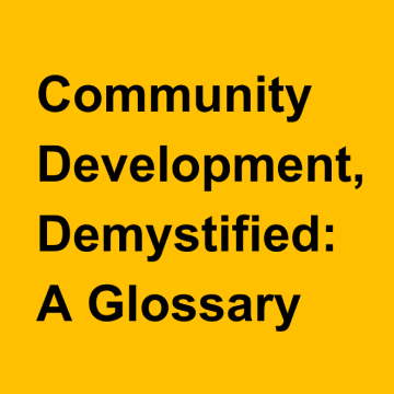 Black and yellow graphic featuring the Momentus Capital logo with the title community development, demystified: a glossary.