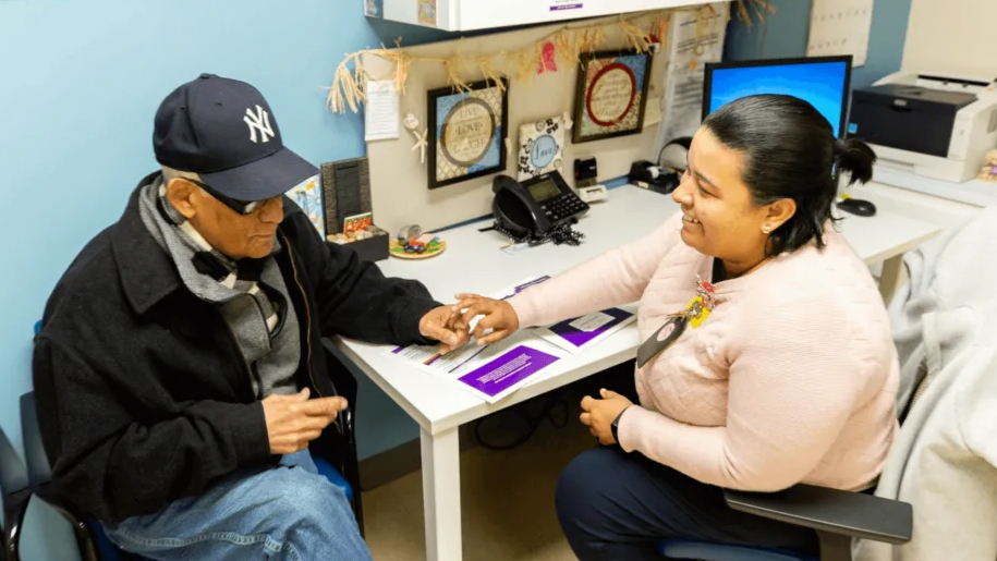 A nurse practitioner meets with a patient in the office of Obran Cooperative, a worker cooperative model focused on sustaining a more effective health care system.