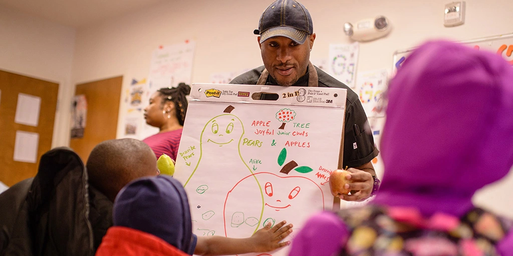 Kids speak with chef at Martha's Table Joyful Food Market