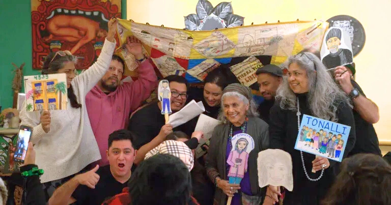 Members of Fideicomiso Comunitario Tierra Libre, a Capital Impact Partners 2025 Co-op Innovation Award winner, pose together as they gather in support of affordable housing initiatives.