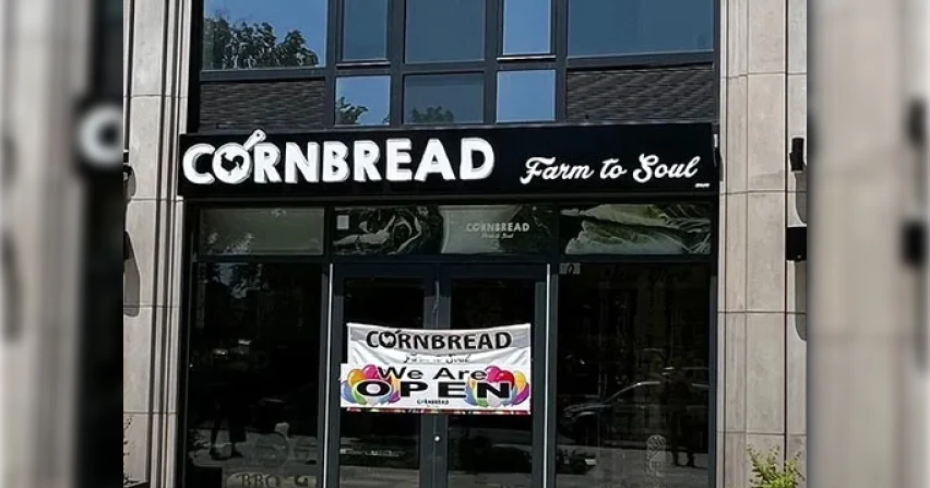 Cornbread storefront in Brownsville that reads ‘we are now open’, a project supported through NMTC financing.